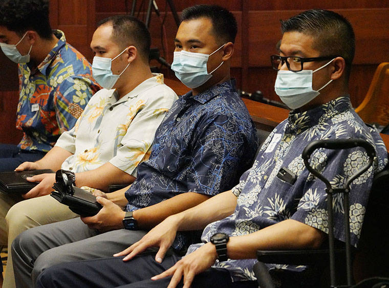 POOL PHOTO COURTESY CORY LUM
                                From left: Honolulu Police Department officers Zachary Ah Nee, Christopher Fredeluces and Geoffrey Thom sit in Judge William Domingo’s courtroom today.