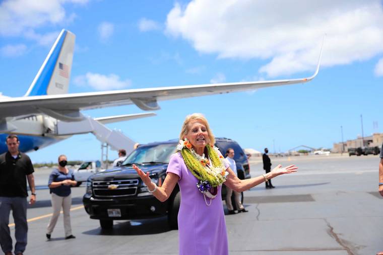 JAMM AQUINO / JAQUINO@STARADVERTISER.COM
                                First lady Dr. Jill Biden arrives at Joint Base Pearl Harbor-Hickam with Executive One Foxtrot behind her.