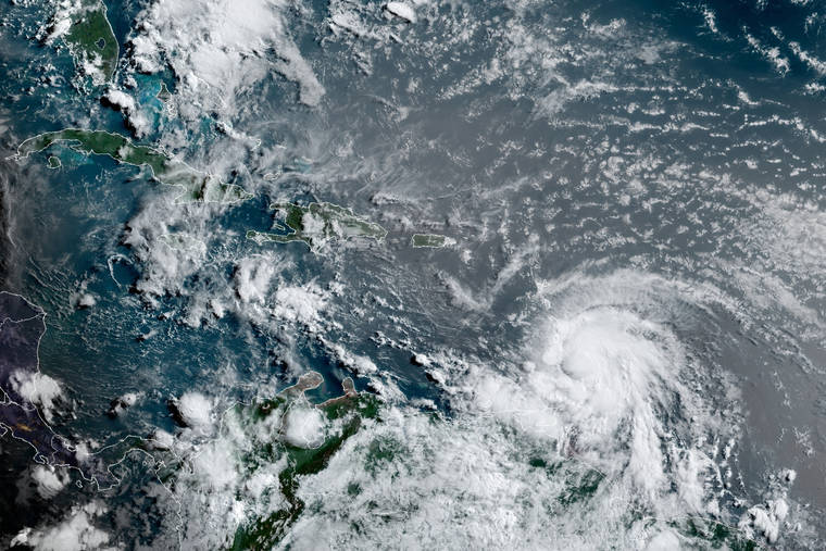 NOAA/NESDIS/STAR GOES VIA AP
                                This satellite image provided by the National Oceanic and Atmospheric Administration shows Hurricane Elsa moving through the Caribbean, over Barbados, Tuesday, July 2, at 12:00 Z (8am a.m. ET). Elsa was expected to pass near the southern coast of Hispaniola on Saturday and to move near Jamaica and portions of eastern Cuba on Sunday.