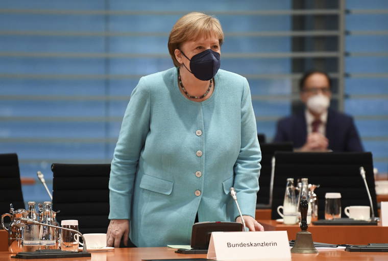 ANNEGRET HILSE/POOL VIA AP
                                German Chancellor Angela Merkel attends the weekly cabinet meeting at the Chancellery in Berlin, Germany.