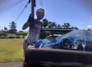 BOTTLES4COLLEGE PRICE VIA ASSOCIATED PRESS
                                Genshu Price stood on the back of a truck, in May, after loading it with recyclable cans and bottles from Kualoa Ranch in Kāne’ohe, for his fundraiser, Bottles4College.