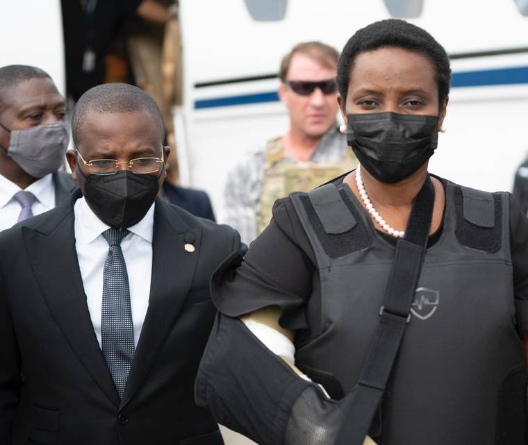 HAITI’S SECRETARY OF STATE FOR COMMUNICATION PHOTO/VIA AP
                                Haiti’s first lady Martine Moise, wearing a bullet proof vest and her right arm in a sling, arrives at the Toussaint Louverture International Airport, in Port-au-Prince, Haiti. Martine Moise, the wife of assassinated President Jovenel Moise, who was injured in the July 7 attack at their private home, returned to the Caribbean nation on Saturday following her release from a Miami hospital.