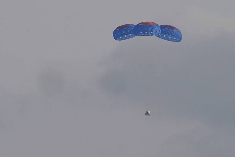 ASSOCIATED PRESS
                                Blue Origin’s New Shepard capsule parachuted, today, safely down to the launch area with passengers Jeff Bezos, founder of Amazon and space tourism company Blue Origin, brother Mark Bezos, Oliver Daemen and Wally Funk, near Van Horn, Texas.