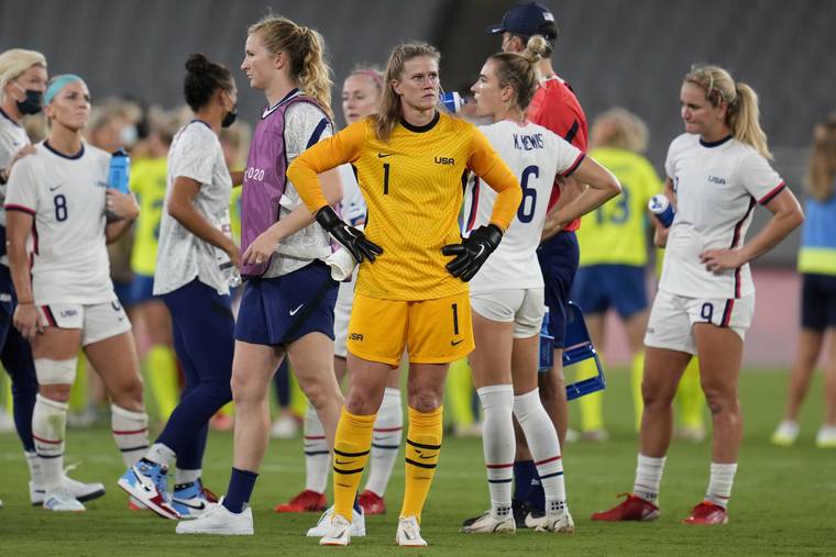 ASSOCIATED PRESS
                                United States’ goalkeeper Alyssa Naeher, center, reacted at the end of a women’s soccer match against Sweden at the 2020 Summer Olympics, Wednesday, in Tokyo. Sweden won 3-0.