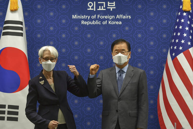 POOL PHOTO VIA AP
                                U.S. Deputy Secretary of State Wendy Sherman bumps elbows with South Korean Foreign Minister Chung Eui-yong prior to their meeting at Foreign Ministry in Seoul, South Korea.