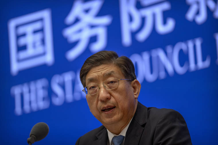 ASSOCIATED PRESS
                                Zeng Yixin, Vice Minister of China’s National Health Commission, speaks at a press conference at the State Council Information Office in Beijing.