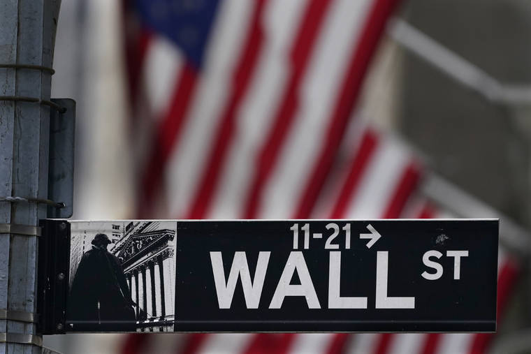 ASSOCIATED PRESS
                                A street sign was displayed, in November 2020, at the New York Stock Exchange in New York.