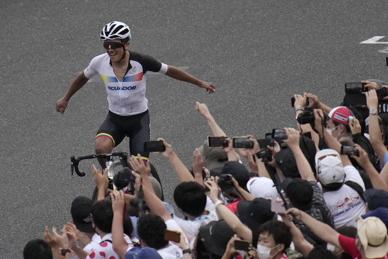 ASSOCIATED PRESS
                                Richard Carapaz of Ecuador reacts after winning the men’s cycling road race.