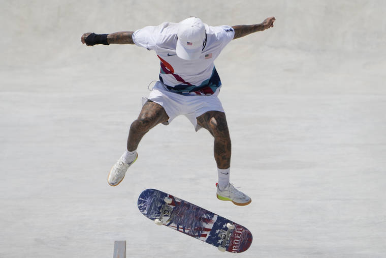 ASSOCIATED PRESS
                                Nyjah Huston of the United States competes during the men’s street skateboarding finals.