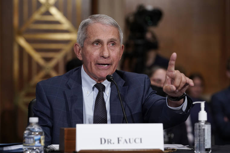 ASSOCIATED PRESS
                                Top infectious disease expert Dr. Anthony Fauci responds to accusations by Sen. Rand Paul, R-Ky., as he testifies before the Senate Health, Education, Labor, and Pensions Committee, on Capitol Hill in Washington on Tuesday. Cases of COVID-19 have tripled over the past three weeks, and hospitalizations and deaths are rising among unvaccinated people.