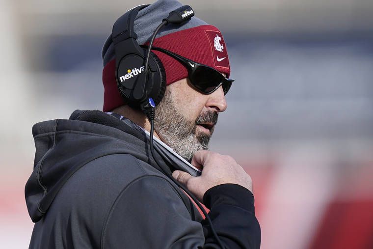 ASSOCIATED PRESS / DEC. 19
                                Washington State head coach Nick Rolovich looks on during the first half of an NCAA college football game against Utah in Salt Lake City on Dec. 19. Rolovich, a former University of Hawaii head coach, has become the story of Pac-12 media day even though he won’t be in attendance because he refuses to get a vaccine.