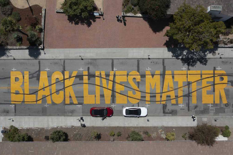 COURTESY SANTA CRUZ POLICE DEPARTMENT VIA ASSOCIATED PRESS
                                A Black Lives Matter Mural painted on a street that was vandalized in Santa Cruz, Calif., on Saturday.