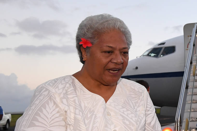 COURTESY LUKAS COCH / AAP IMAGE VIA ASSOCIATED PRESS / 2017
                                Then Deputy Prime Minister of Samoa Fiame Naomi Mata’afa speaks with Australian Prime Minister Malcolm Turnbull and the Australian High Commissioner to Samoa Sue Langford as they arrive at Faleolo Airport in Apia, Samoa.