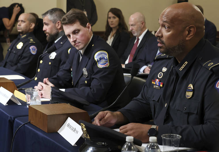 ASSOCIATED PRESS
                                U.S. Capitol Police Sgt. Aquilino Gonell, from left, Washington Metropolitan Police Department officer Michael Fanone, Washington Metropolitan Police Department officer Daniel Hodges and U.S. Capitol Police Sgt. Harry Dunn testify before the House select committee hearing on the Jan. 6 attack on Capitol Hill in Washington Tuesday.