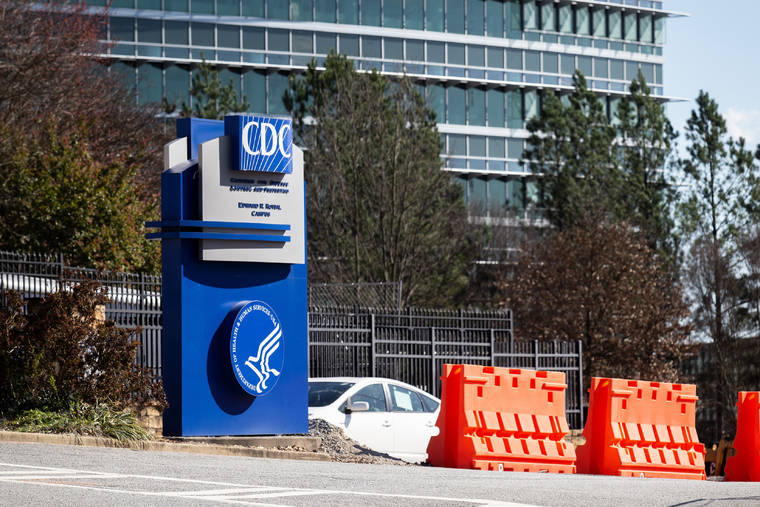 ASSOCIATED PRESS / MARCH 6, 2020
                                The Centers for Disease Control and Prevention is expected to backpedal on its masking guidelines and recommend that even vaccinated people wear masks indoors in parts of the U.S. where the coronavirus is surging, according to a federal official who spoke on condition of anonymity. The CDC headquarters in Atlanta is shown here.