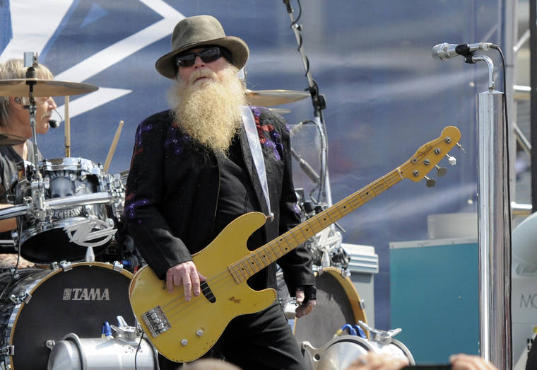 ASSOCIATED PRESS
                                Dusty Hill, of ZZ Top, performs before the start of the NASCAR Sprint Cup series auto race in Concord, N.C., in 2015. ZZ Top has announced that Hill, one of the Texas blues trio’s bearded figures and bassist, has died at his Houston home. He was 72.