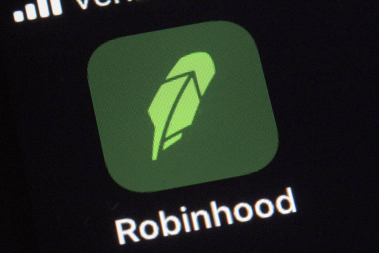 ASSOCIATED PRESS / 2020
                                The logo for the Robinhood app on a smartphone in New York.