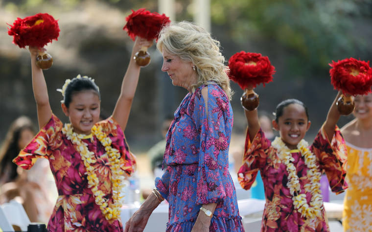 JAMM AQUINO / JAQUINO@STARADVERTISER.COM
                                First lady Jill Biden walks past hula dancers with Ka Pa Nani o Lilinoe during a barbecue at the gym and recreation area of Makalapa Crater at Joint Base Pearl Harbor-Hickam on Sunday. The first lady is undergoing a medical procedure today to remove an object that became lodged in her foot while walking on a beach in Hawaii, her spokesman said.