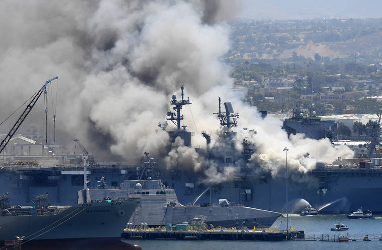 ASSOCIATED PRESS / 2020
                                Smoke rises from the USS Bonhomme Richard in San Diego after an explosion and fire on board the ship at Naval Base San Diego.