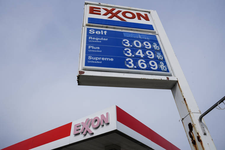 ASSOCIATED PRESS / APRIL 28
                                An Exxon service station sign in Philadelphia.