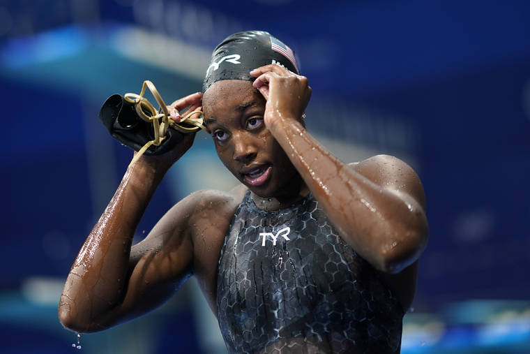 ASSOCIATED PRESS
                                Simone Manuel, of United States, leaves the pool after a women’s 50-meter freestyle semifinal at the 2020 Summer Olympics.