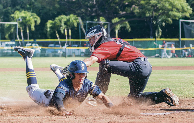 STAR-ADVERTISER / 2018
                                Former Punahou baseball player Kyson Donahue slides under the tag of Iolani catcher Micah Yonamine during a game between the two teams in 2018.