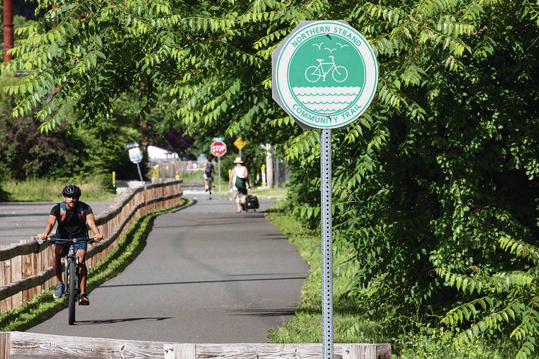 NEW YORK TIMES
                                Part of the pioneering cycling tour includes access to the Northern Strand Community Trail in Revere, Mass.