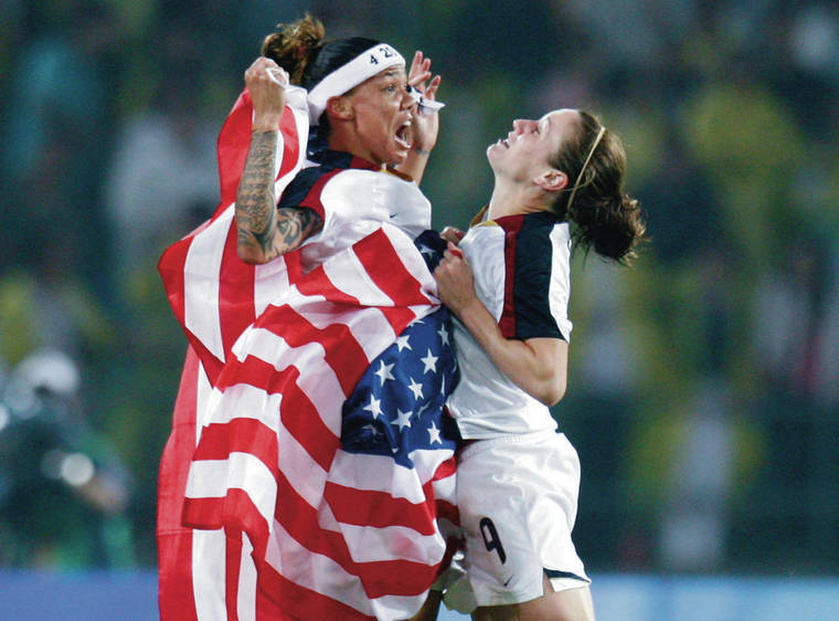 ASSOCIATED PRESS / 2008
                                The United States’ Natasha Kai, left, and Heather O’Reilly celebrate after beating Brazil 1-0 in the women’s soccer gold-medal match at the Beijing 2008 Olympics.
