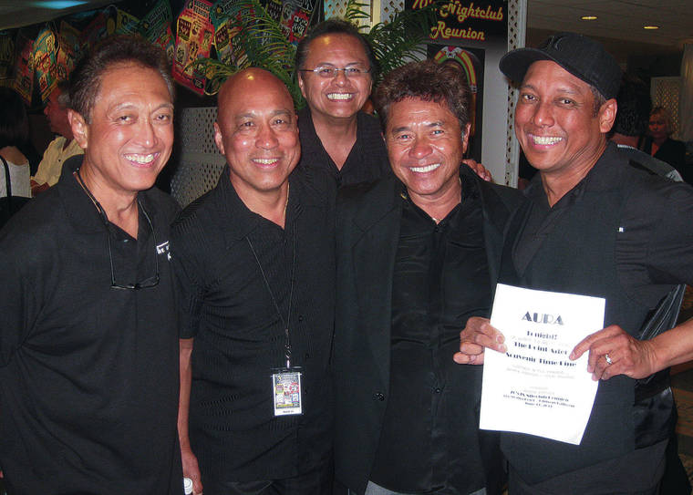 STAR-ADVERTISER / 2011
                                Dennis Mendoza, left, with Sandy Pascual, Hemmingway Jasmin, “Little Albert” Magligmat and Michael Mendoza at the Ala Moana Hotel.