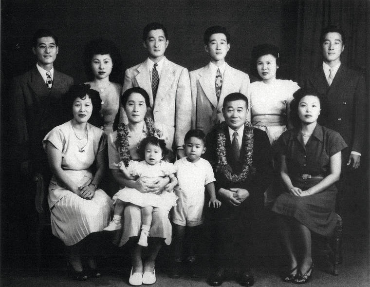 COURTESY HIRAO FAMILY
                                Richard Hirao stands third from the left in the second row, next to his brother, Thomas, Both are part of the second generation of Hiraos who ran the Nisshodo Candy Store. Sitting in the dark suit is grandfather and founder Asataro Hirao. Next to him is his wife, Kumayo, in a photo from the late 1940s.