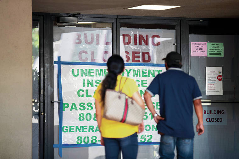 CINDY ELLEN RUSSELL / DEC. 2
                                The state Department of Labor and Industrial Relations offices will reopen for in-person meetings on Sept. 7. Two people attempted to visit the closed DLIR offices on Punchbowl Street in December.
