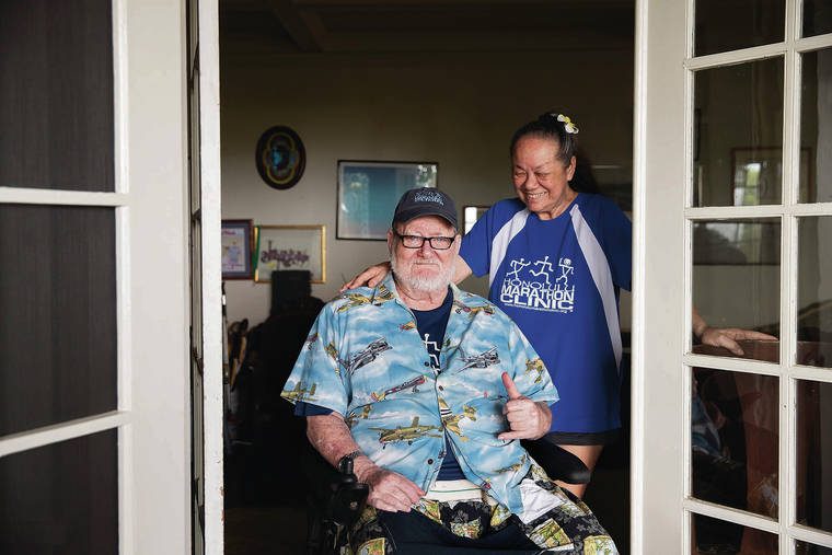 CINDY ELLEN RUSSELL / CRUSSELL@STARADVERTISER.COM 
                                Honolulu Marathon founder Jack Scaff, at his Round Top home with his wife, Donna, had a stroke right before the COVID-19 pandemic and almost died. He survived it, and the marathon will be back this year.