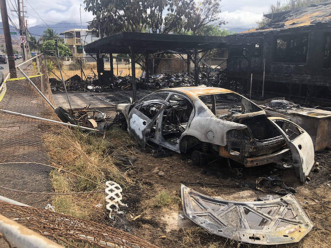 CRAIG T. KOJIMA / CKOJIMA@STARADVERTISER.COM
                                The Honolulu Fire Department is investigating a fire that destroyed the house at 87-794 Farrington Highway near the intersection of Maipalaoa Road in Maili overnight.