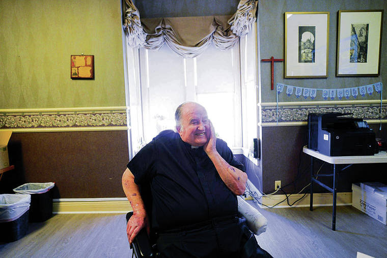 TRIBUNE NEWS SERVICE
                                Enjoying his retirement since 2011, Father Joe Carroll works out of his home in the East Village, not far from the Father Joe’s Villages in San Diego.