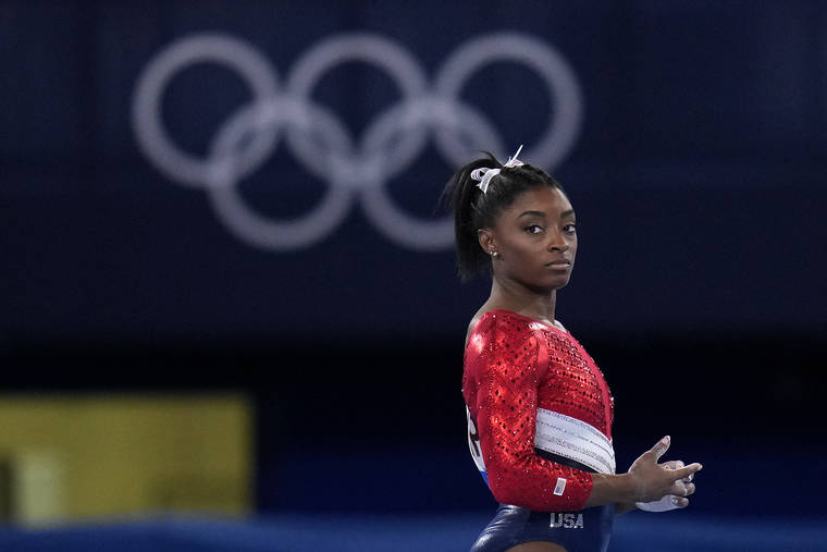 ASSOCIATED PRESS
                                Simone Biles, of the United States, waits to perform on the vault during the women’s final at the 2020 Summer Olympics on Tuesday.