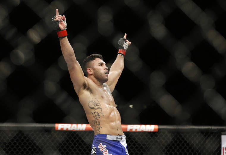 ASSOCIATED PRESS
                                Brad Tavares celebrates after a victory at UFC 182 in 2015.
