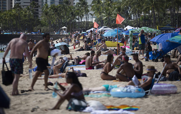 CINDY ELLEN RUSSELL / CRUSSELL@STARADVERTISER.COM
                                The Hawaii Tourism Authority has begun a reorganization that focuses on destination management. Tourists and residents Sunday gathered along the shores of Waikiki to enjoy the Fourth of July.