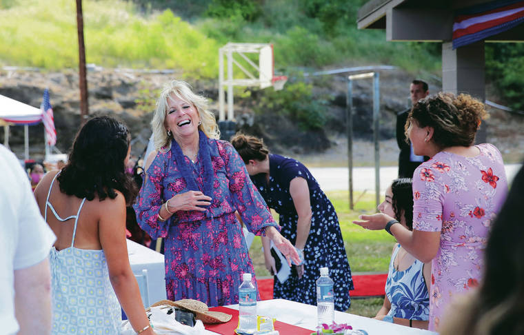 CINDY ELLEN RUSSELL / CRUSSELL@STARADVERTISER.COM
                                First lady Jill Biden shared a laugh Sunday with the Cantero family, including 12-year-old Ashley, bottom right, and mother Angelica at the gym and recreation area of Makalapa Crater at Joint Base Pearl Harbor-Hickam.