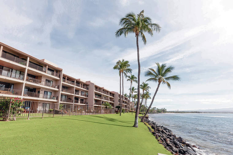 BRYAN BERKOWITZ / SPECIAL TO THE STAR-ADVERTISER
                                Maui condo sales more than tripled to 246 in June from 67 a year earlier. Condominiums along the beach in Maalaea, Maui, in March 2020.