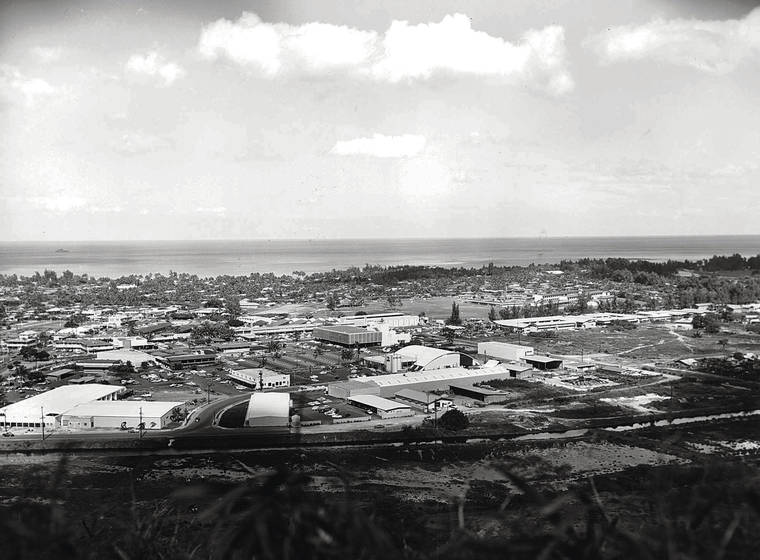 STAR-ADVERTISER
                                A view of Kailua in 1962 shows the domed roof of Pali Lanes bowling alley (center), which just closed, and the empty field (far right) where Target is today.