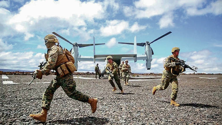 COURTESY U.S MARINE CORPS 
                                U.S Marines disembarked an MV-22 Osprey during an exercise at Pohakuloa Training Area.