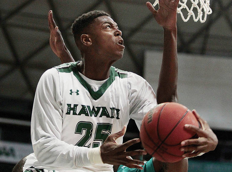 STAR-ADVERTISER / 2015
                                Hawaii Warriors forward Michael Thomas (25) fights his way to the net against Coastal Carolina Chanticleers forward Tristian Curtis (21) in the first half of the University of Hawaii Warriors against the Coastal Carolina Chanticleers men’s basketball game in the Outrigger Resorts Rainbow Classic at the Stan Sheriff Center in Manoa on Sunday, November 15, 2015.