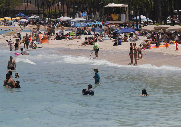 JAMM AQUINO / JAQUINO@STARADVERTISER.COM
                                Throngs of beachgoers were seen at Waikiki Beach on July 5. The Hawaii Department of Health today warned residents and visitors of several sunscreens that have been recalled due to the presence of benzene, which is known to cause cancer in humans.
