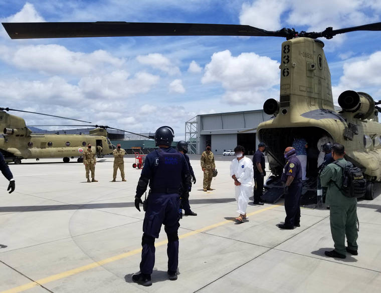 STATE DEPARTMENT OF PUBLIC SAFETY
                                Corrections officers and deputy sheriffs provided in-flight and ground security Tuesday as the Hawaii Army National Guard flew 40 Big Island inmates to Oahu “without incident” on two Chinook helicopters, the state Department of Public Safety said.