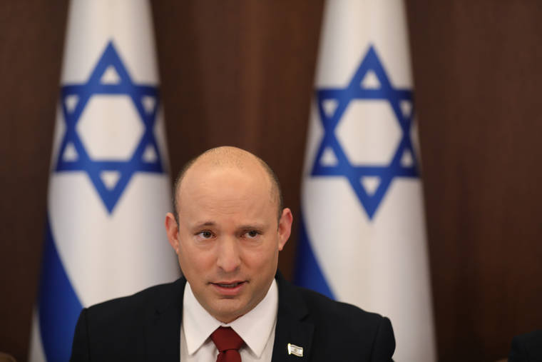 ASSOCIATED PRESS
                                Israeli Prime Minister Naftali Bennett attends a cabinet meeting at the prime minister’s office in Jerusalem today.