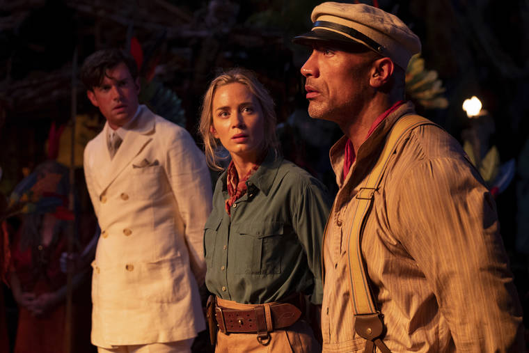 DISNEY VIA AP
                                “Jungle Cruise,” with (from left) Jack Whitehall, Emily Blunt and Dwayne Johnson, topped the U.S. box office this weekkend.