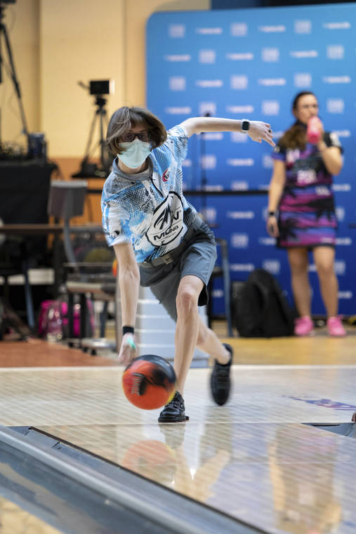 USBC VIA AP / JAN. 21
                                Critical care nurse and professional bowler Erin McCarthy competes at the 2021 PWBA Kickoff Classic Series in Arlington, Texas. “You have to have a calm demeanor and think clearly,” McCarthy says. “I think that’s probably why I love doing them both equally as much.”