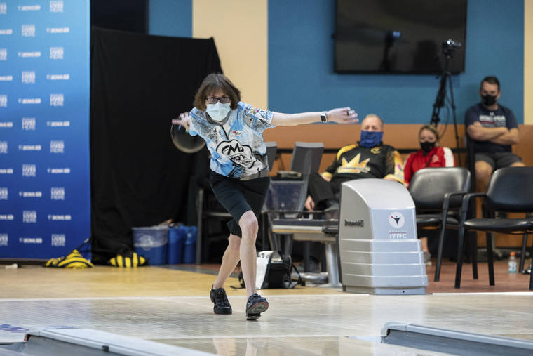 USBC VIA AP / JAN. 26
                                Critical care nurse and professional bowler Erin McCarthy competes at the 2021 PWBA Kickoff Classic Series in Arlington, Texa. “You have to have a calm demeanor and think clearly,” McCarthy says. “I think that’s probably why I love doing them both equally as much.”