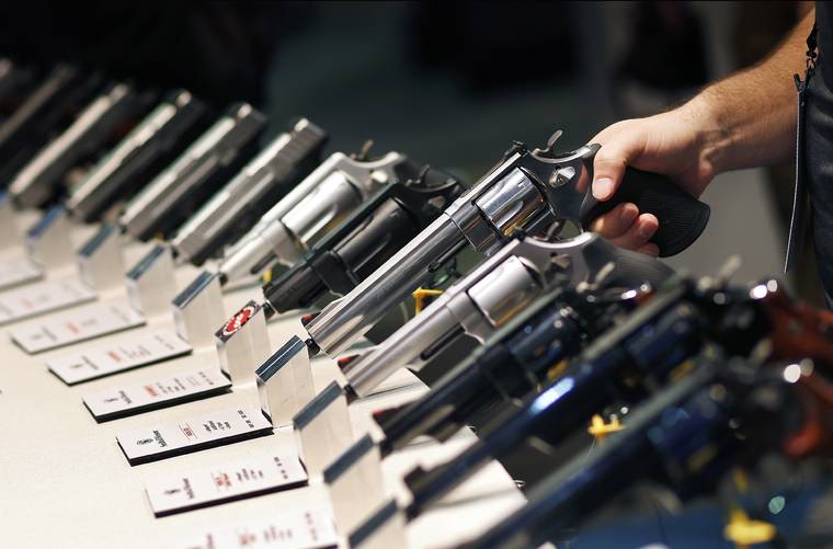 ASSOCIATED PRESS / 2016
                                Handguns are displayed at the Smith & Wesson booth at the Shooting, Hunting and Outdoor Trade Show in Las Vegas. The Mexican government sued U.S. gun manufacturers and distributors, including some of the biggest names in guns like Smith & Wesson Brands, on Aug. 4, in U.S. federal court in Boston, arguing that their commercial practices have unleashed tremendous bloodshed in Mexico.