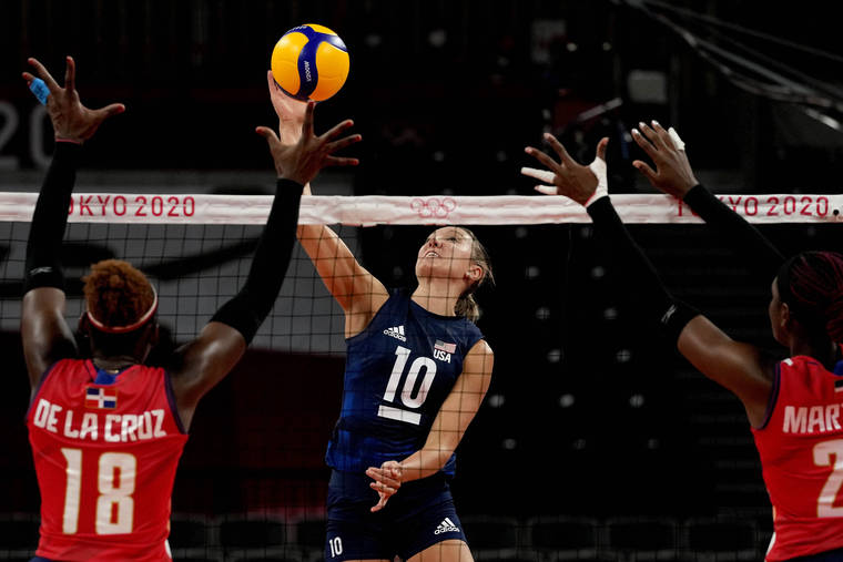 ASSOCIATED PRESS
                                United States’ Jordan Larson hits the ball during the women’s volleyball quarterfinal match between Dominican Republic and United States at the 2020 Summer Olympics, Wednesday, in Tokyo, Japan.